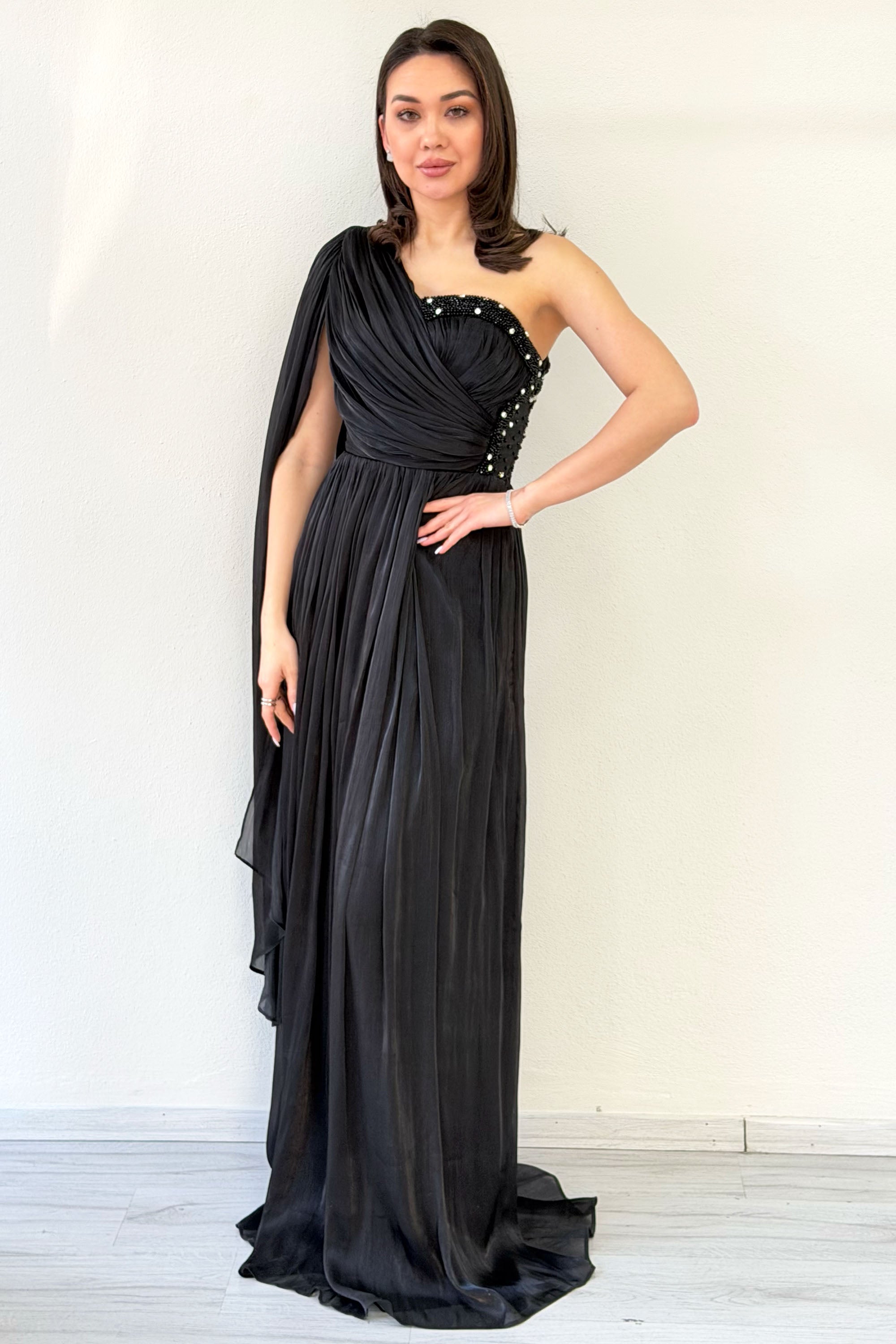 Black One-Shoulder Cape Dress with Drape and Stone Details