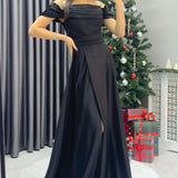 فستان سهرة ماكسي من الساتان الأسود بحمالات